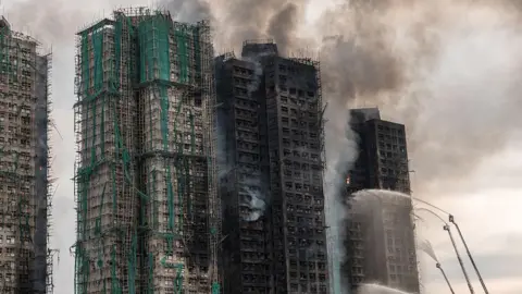 Fury and Questions Emerge After Hong Kong's Deadliest Blaze