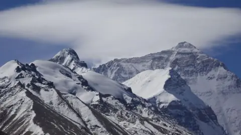 Blizzard Strikes Everest: Hikers Face Hypothermia as Rescues Ongoing