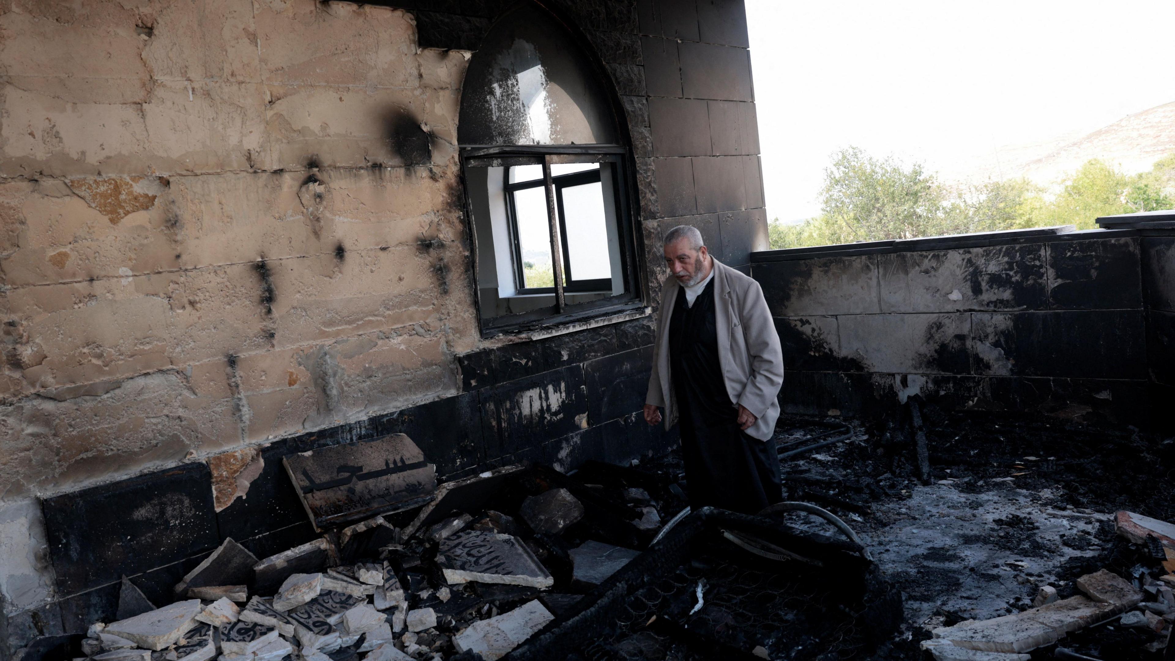 Israeli settlers ignite mosques and farmland in West Bank, Palestinians report