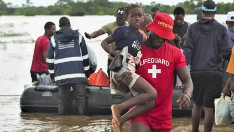 Historic Floods Leave People Clinging to Treetops in Mozambique