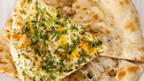 The Journey of Naan: From Royal Delicacy to Global Favorite