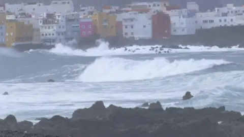 Tragic Tidal Surge in Tenerife: Death Toll Rises to Three, 15 Injured