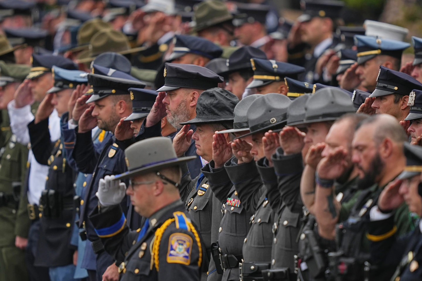 Community Mourns Slain Officers at Their Funeral
