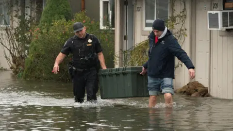 Record Flooding Forces Evacuations in Pacific Northwest