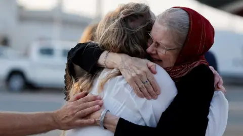 Joyful Reunion: British Couple Released from Taliban Detention Returns Home
